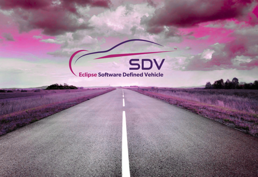 Straight, empty road stretching into the distance under a dramatic cloudy sky tinted pink and purple. Centered above the road is the ‘SDV – Eclipse Software Defined Vehicle’ logo, suggesting a forward-looking journey and future mobility